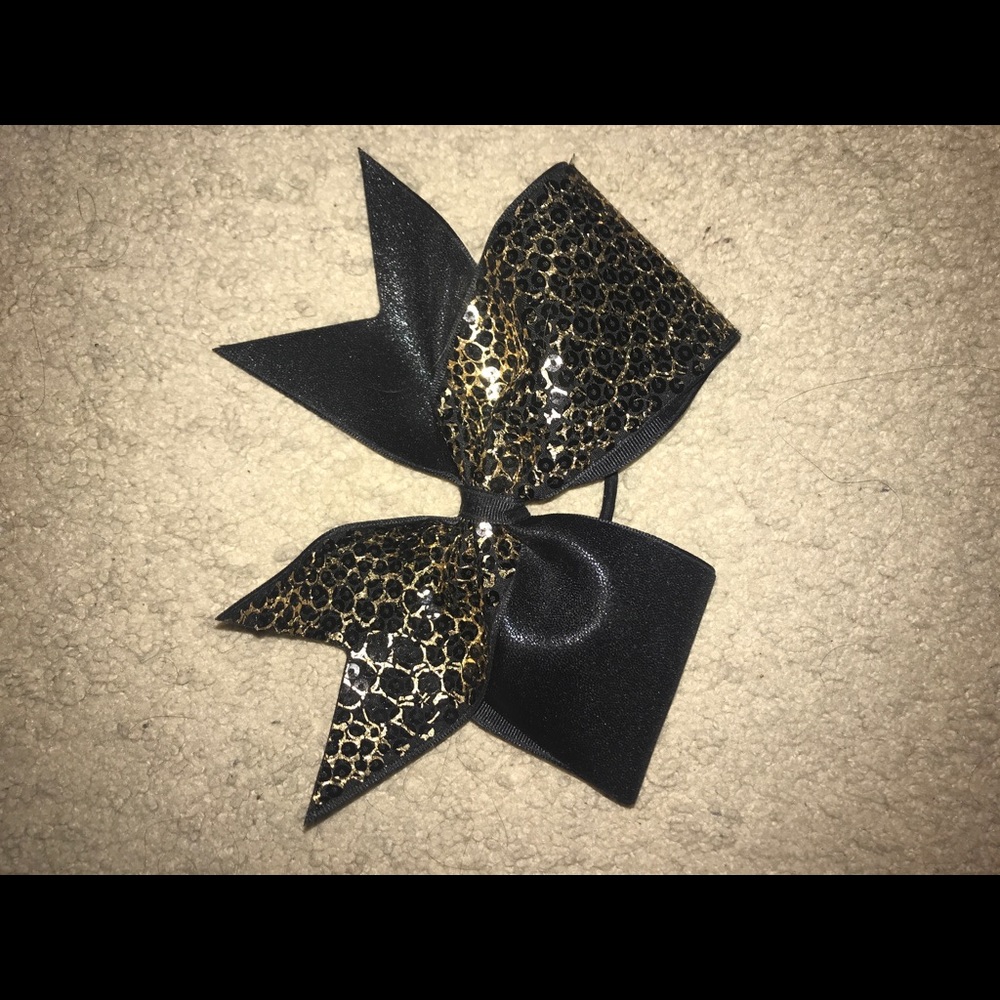 Black and gold cheer bow.